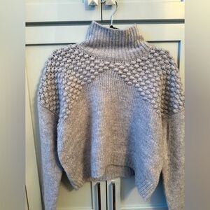 Women's Free People sweater. New with tags size small